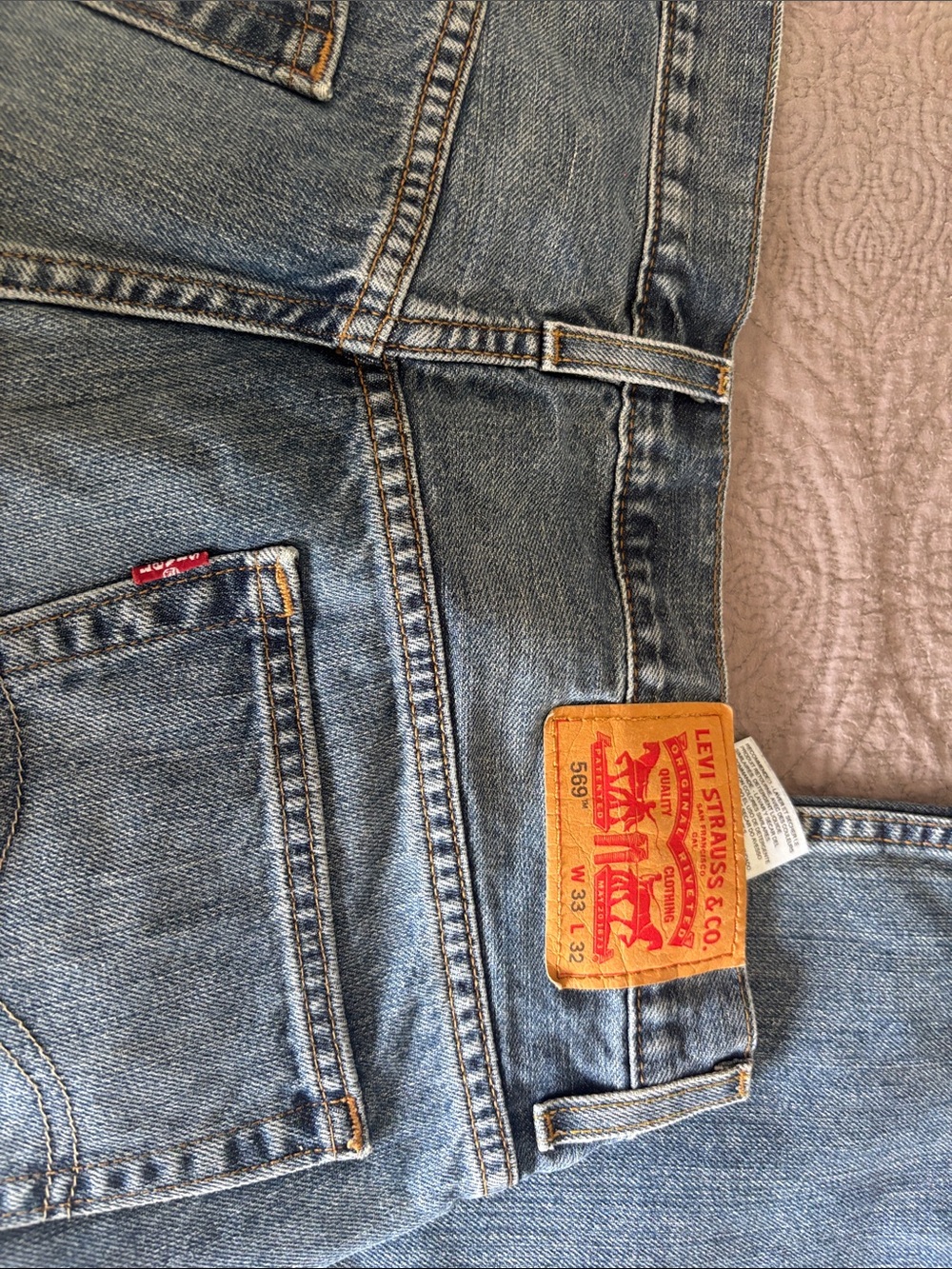 Levi's 569 Relaxed Men's Jeans in Light Blue Denim with Leather Patch
